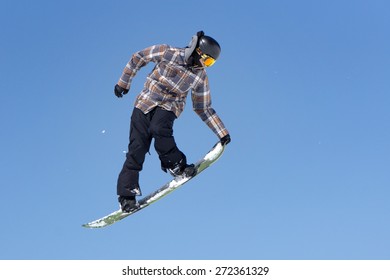 Snowboarder Jumps In Snow Park, Big Air