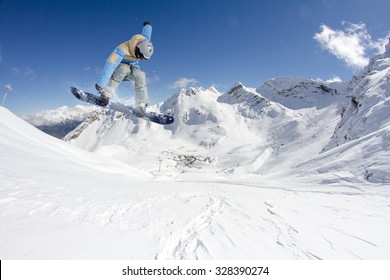 Snowboarder Jumps In Snow Park, Big Air