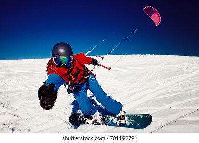 parachute snowboarding