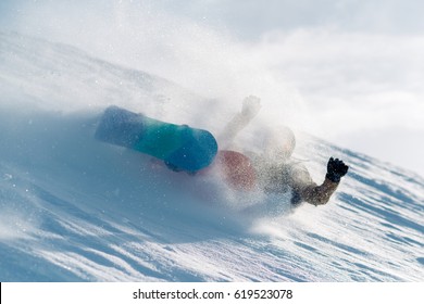 Snowboarder Is Riding With Snowboard From Powder Snow Hill Very Fast And Fall Down