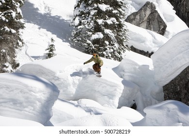 Snowboarding Dangerous Backcountry Terrain Jumping Off Pillows