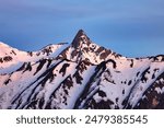 Snow-capped Mount Yari in the Northern Alps at sunrise in Japan