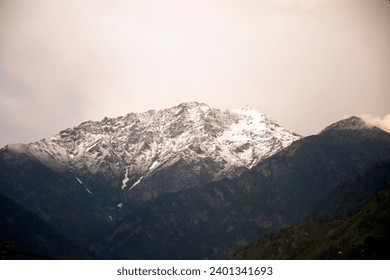 Snow-capped mountain before the sunset