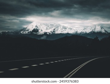 Snow-capped peaks seen from the road - Powered by Shutterstock