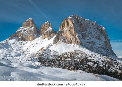 
Snow-capped Sassolungo mountain seen from Passo Sella in the Italian Dolomites. Grohman peak.