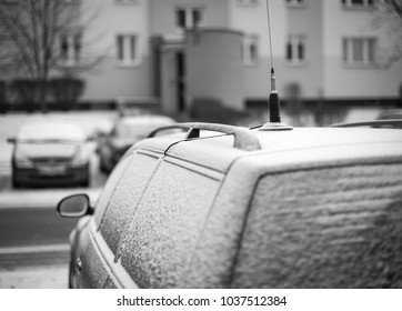 Snow-covered Car From The Side,cb Radio Antenna On The Roof