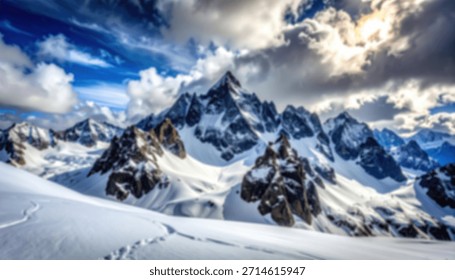 A snow-covered mountain range rises dramatically under a cloudy blue sky, creating a scenic vista.