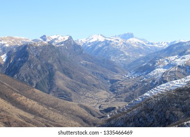 Snow-covered Mountain Ranges. Stunning Mountain Landscape. Blue Sky Over The Mountains. Fresh Mountain Air. Unlimited Freedom.