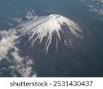 Snow-covered Mt. Fuji as seen from the airplane