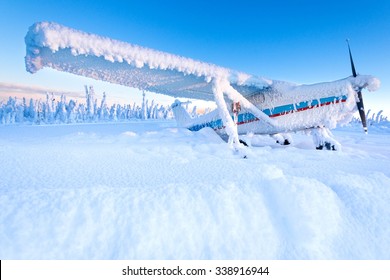 snowcovered-prop-plane-260nw-338916944.jpg