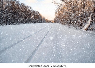 Snow-covered railway tracks. Empty railway in winter. - Powered by Shutterstock