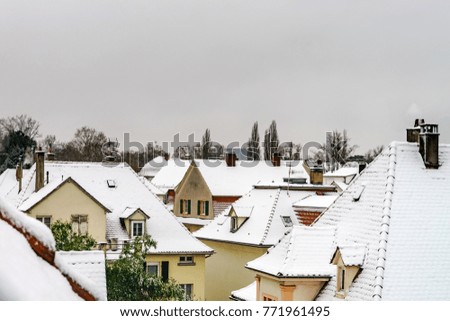 Snow-covered roors of old quarter in Strasbourg after snowfall, France