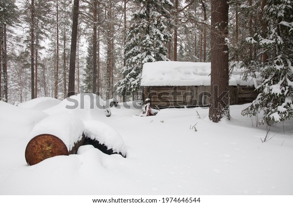 Snowed in cabin after\
heavy snow fall