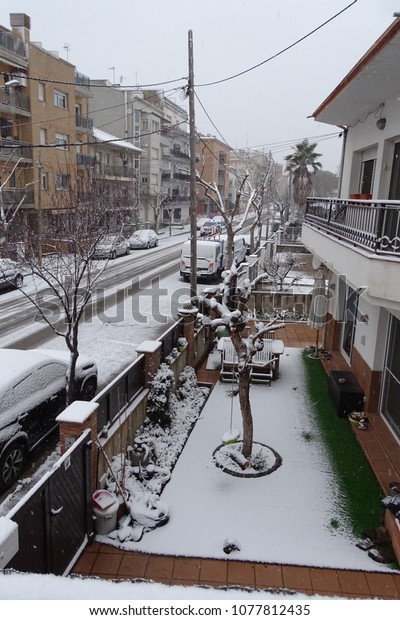 snowed street view, winter time, Cardedeu, March 3,\
2018, Catalonia, Spain