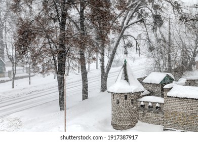 Snowfall In The City. Snowy City Road. Seasonal Phenomenon. Winter Snow Background