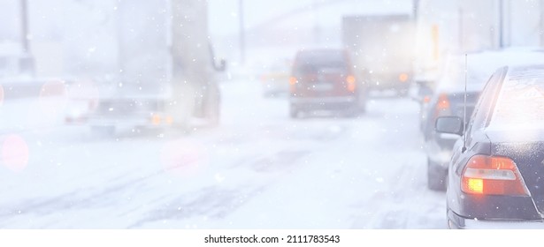 Snowfall In City Traffic Jam In Winter, Background Seasonal Snow Highway Road