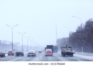 Snowfall In City Traffic Jam In Winter, Background Seasonal Snow Highway Road