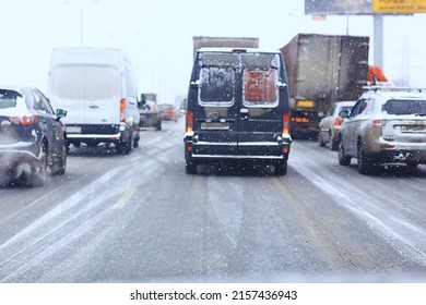 Snowfall In City Traffic Jam In Winter, Background Seasonal Snow Highway Road