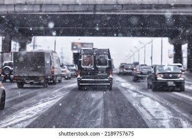 Snowfall In City Traffic Jam In Winter, Background Seasonal Snow Highway Road