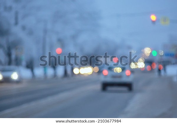 snowfall in city traffic jam in winter, background\
seasonal snow highway\
road