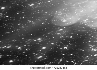 Snowfall Isolated On Black Background. Round Bokeh Or Snowflakes Particles . Design Element