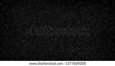 Snowfall on a black background