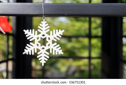 Snowflake decoration hanging. Soft focus