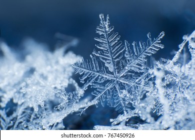 Snowflake on a blue background 