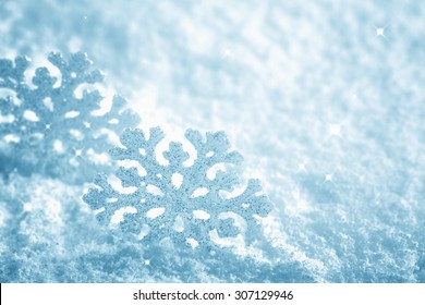 snowflake on snow.Winter holidays decoration.