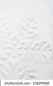 Snowflake Shape On The Snow. White Xmas Holiday Background.