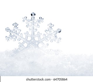 Snowflake In White Snow. Isolated.