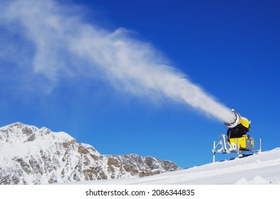 Snow-gun Spraying Artificial Ice Crystals. Machine Making Snow.