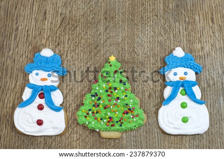Snowman And Christmas Tree Sugar Cookies Decorated With Royal Icing Candy Accents Served On Snowman And Christmas Tree Sugar Cookies Decorated With Royal Icing Candy Accents Served On