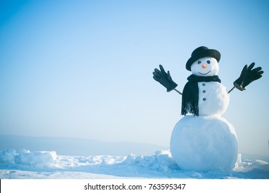 Snowman gentleman in winter black hat, scarf and gloves. New year snowman spy agent. Christmas and winter fashion. Happy holiday celebration. Xmas or christmas party, copy space