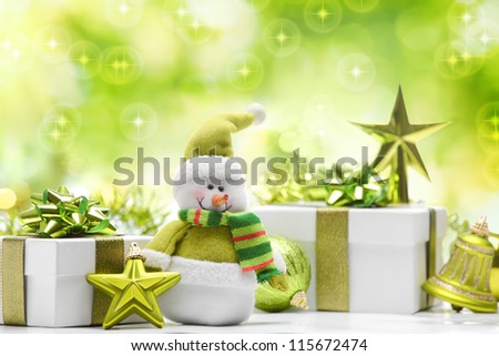 Snowman and gift boxes on abstract background