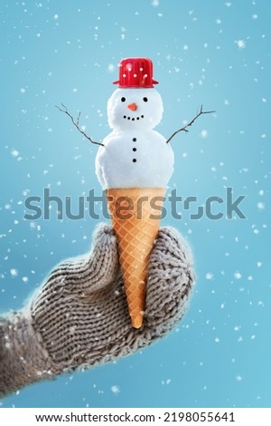 Snowman in an Ice cream cone, cute winter-summer concept 