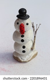 Snowman Made Of Painted Pebbles