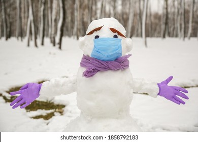 Snowman In A Medical Mask And Gloves