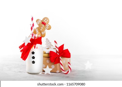 Snowman Milk Bottle with Gingerbread man and candy cane - Powered by Shutterstock