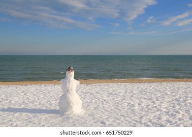 Snowman On The Beach 