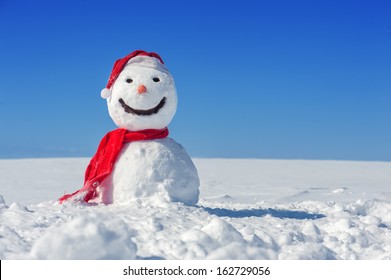 snowman on blue sky background - Powered by Shutterstock