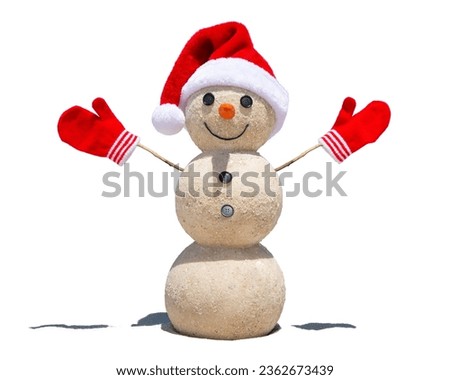 Snowman. Sandy Snowman made of sand snowballs. Christmas snowman with red Santa Claus hat and mittens. Smiley Snow man. Winter Holidays without snow. Happy New Year. Xmas postcards. Florida vacations