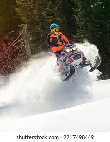 snowmobile fun. sports snow bike with snow splashes and snow trail. bright snowmobile and suit without brands. snowmobilers sports riding. stock photo very high quality - Shutterstock ID 2217498449