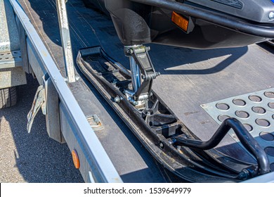 Snowmobile On A Car Trailer. Ski Close-up. Concept.