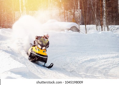 Snowmobile Races In Snow. Concept Winter Sports