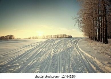 Snowmobile Tracks On The Snow