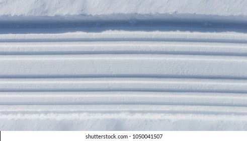 Snowmobile Tracks At Snow Surface