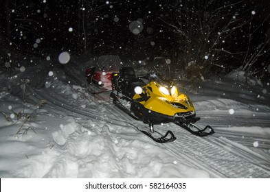 Snowmobile Trailer, At Night, In The Falling Snow