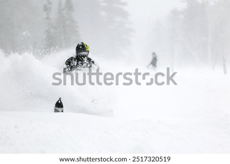 Snowmobiling deep snow, Upper Peninsula Michigan.