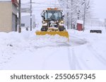 A snowplow clearing the snow from roads. Yamagata, Japan.